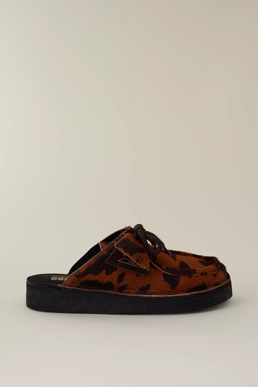 clarks desert nomad cow print mule