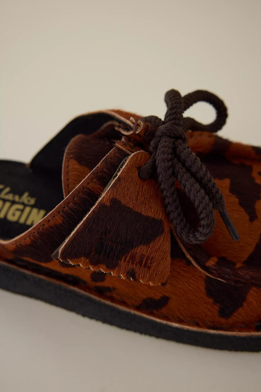 clarks desert nomad cow print mule